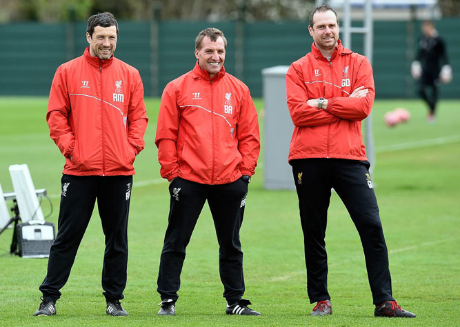 Brendan Rodgers manager of Liverpool and Glen Driscoll head of performance and Ryland Morgans head of fittness